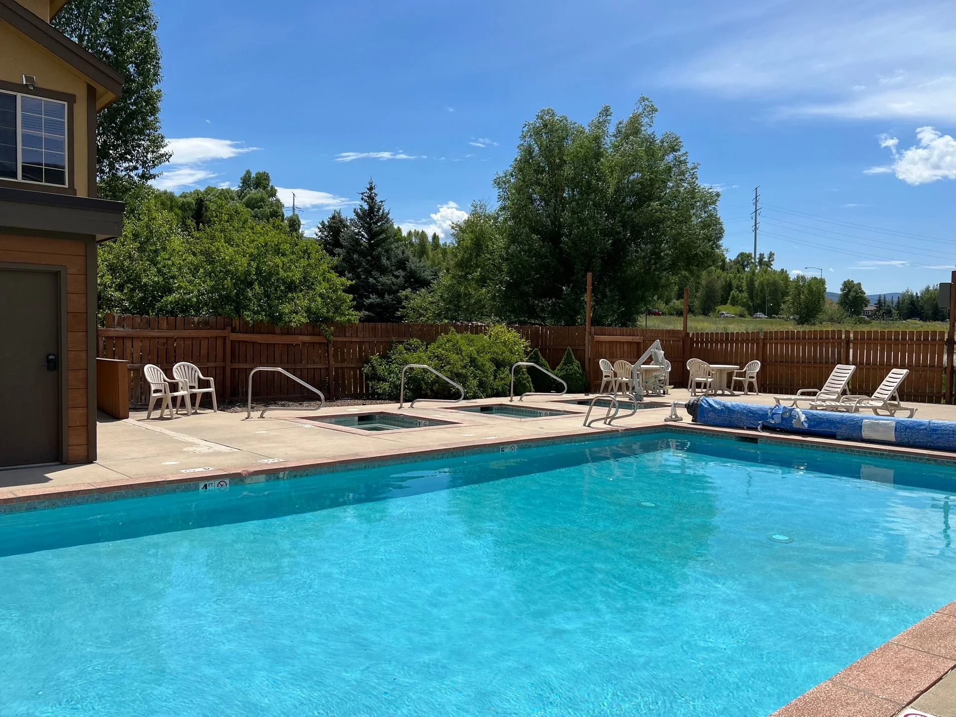 Outdoor Pool & Hot Tubs at Ski Town Apartments